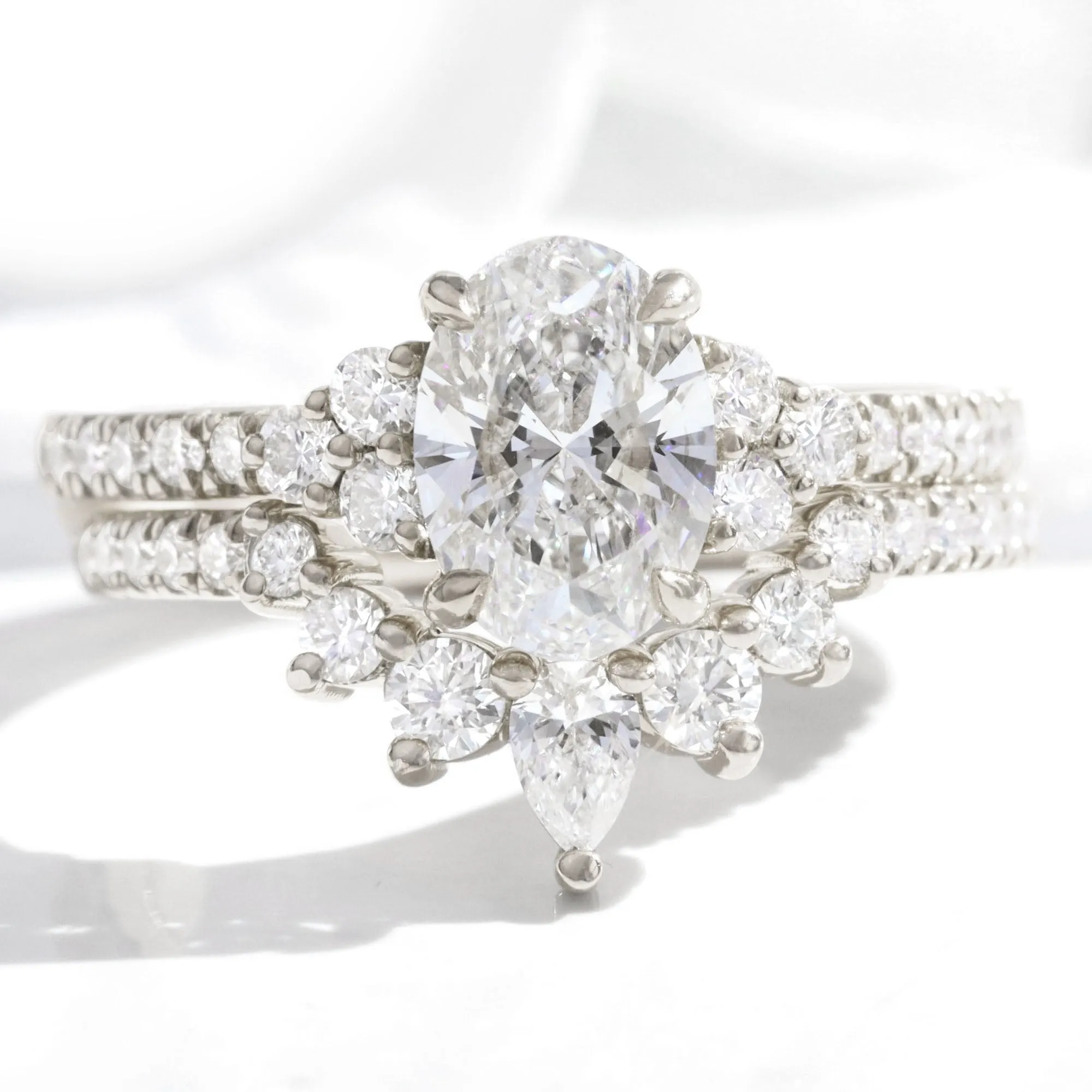 1.94 Ct. Oval Lab Diamond 3 Stone Ring Set w/ Crescent Wedding Band in Stella Setting