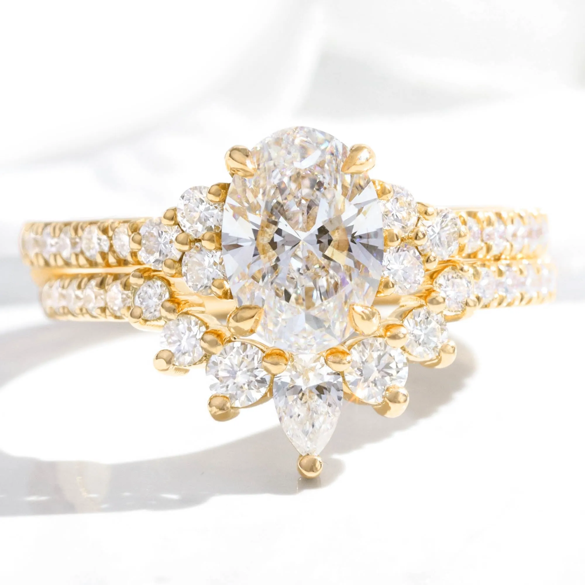 1.94 Ct. Oval Lab Diamond 3 Stone Ring Set w/ Crescent Wedding Band in Stella Setting