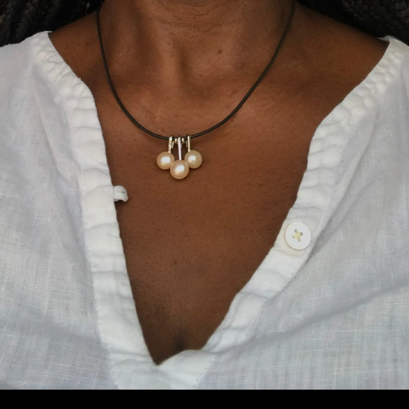 3 pearl necklace on a leather cord  necklace
