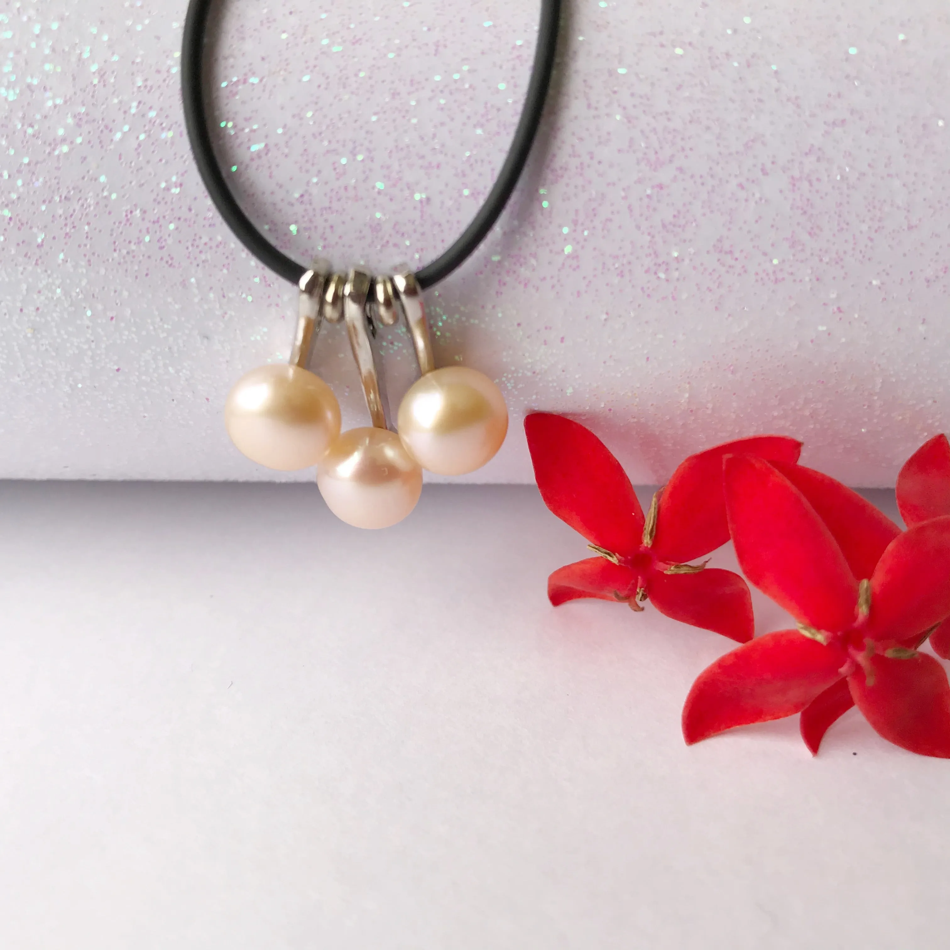 3 pearl necklace on a leather cord  necklace