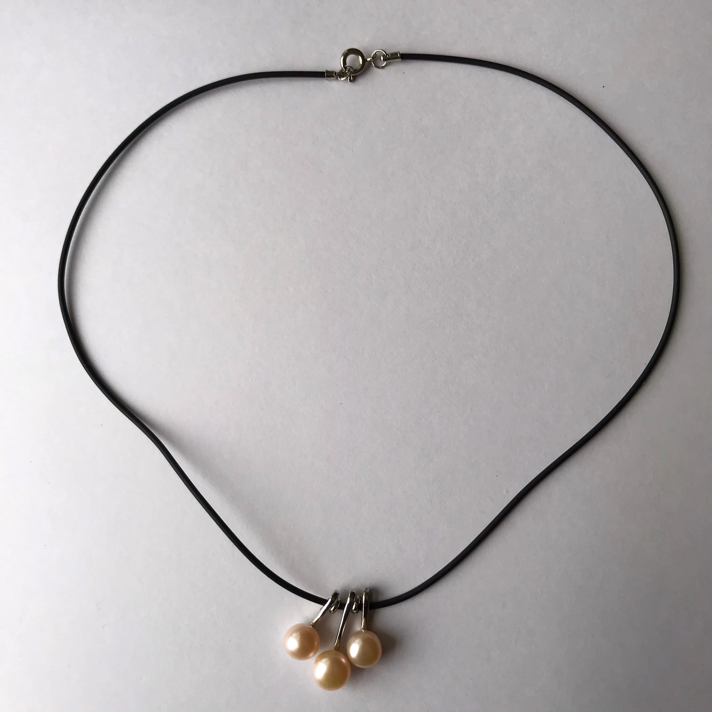3 pearl necklace on a leather cord  necklace