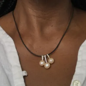 3 pearl necklace on a leather cord  necklace