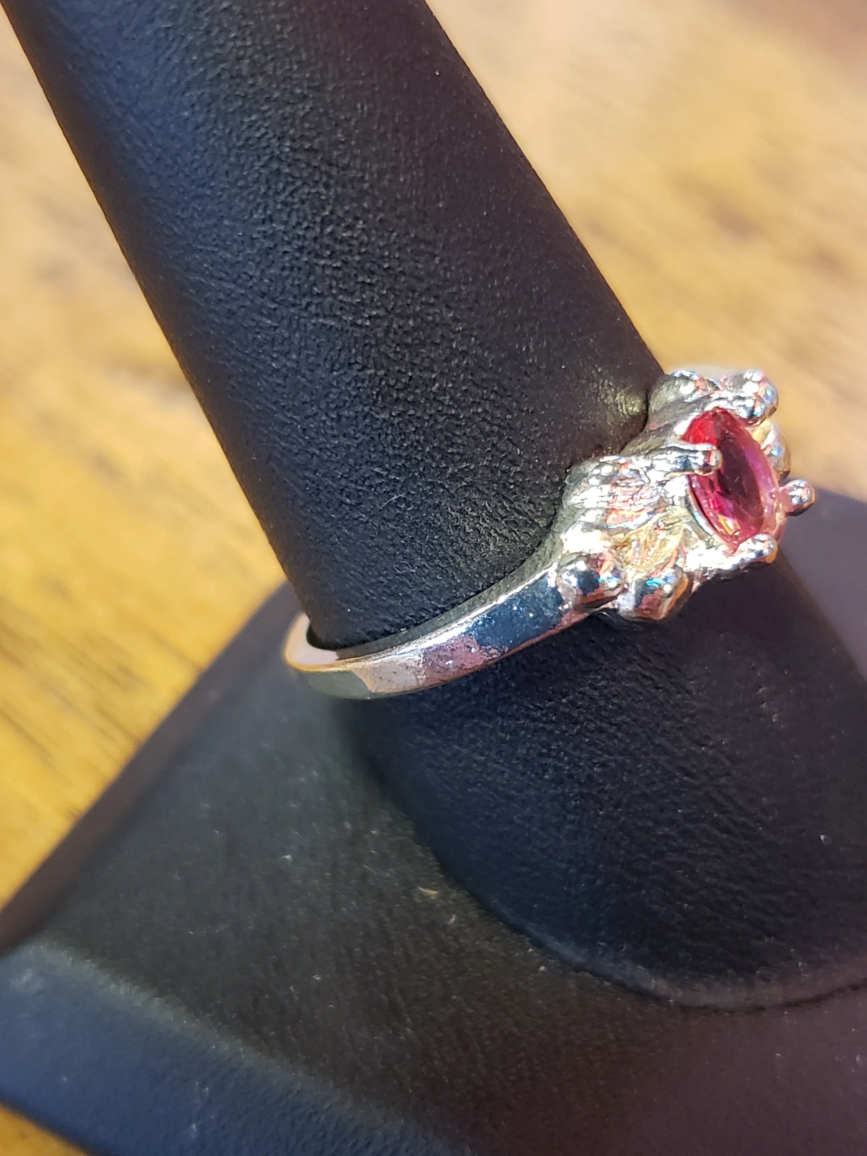 .925 ring with pink stone in bow size 9.5