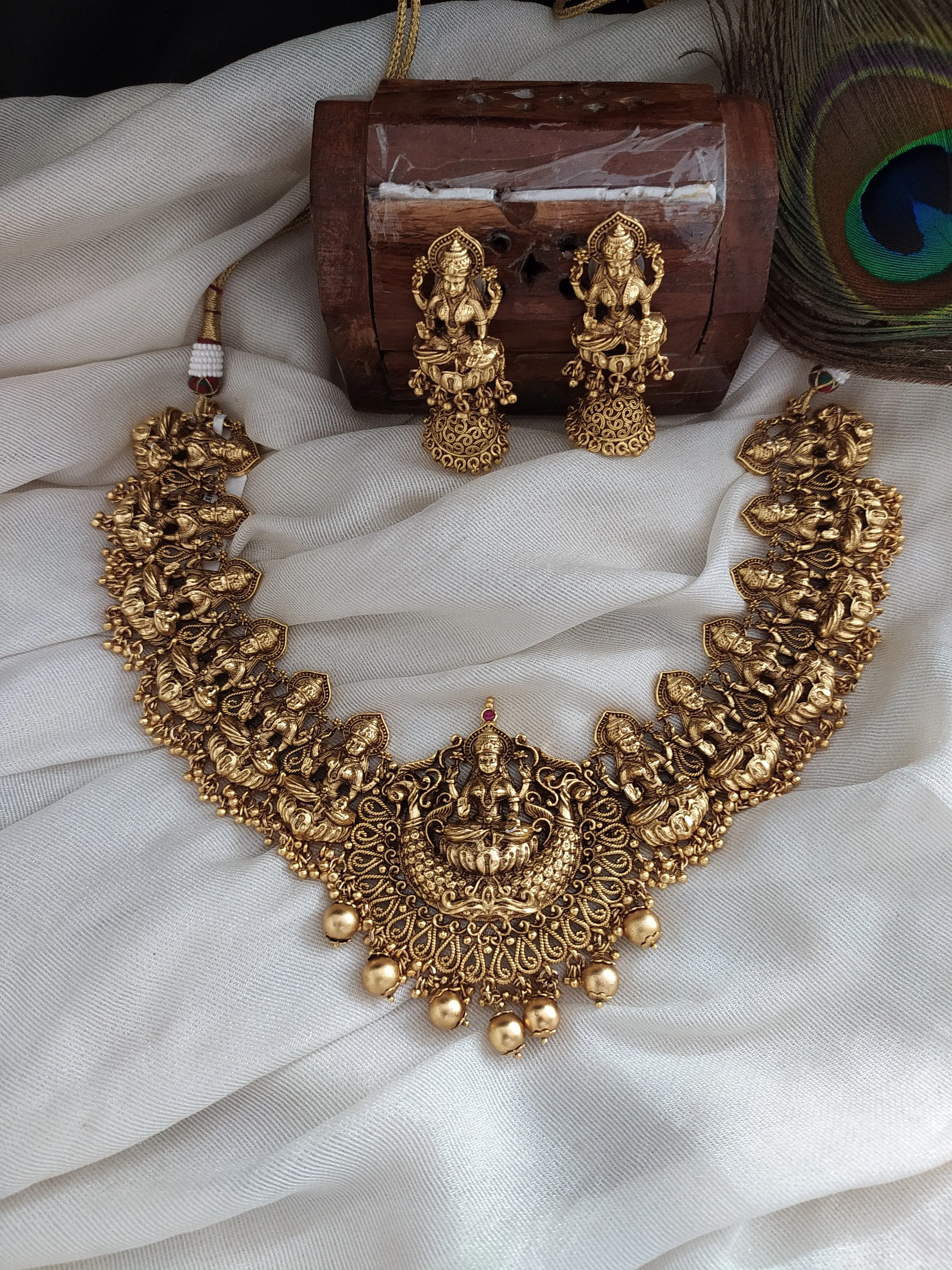 Antique Finish Necklace Set With Lord Lakshmi With Matching Jhumki