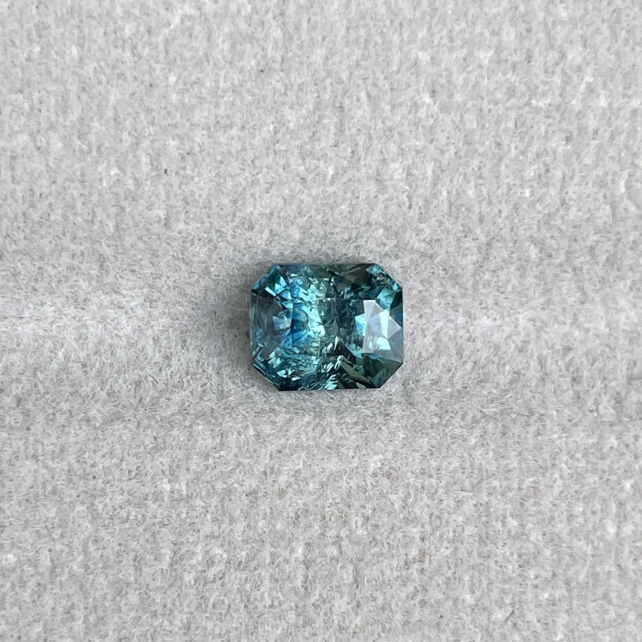 Natural Blue Green Sapphire Radiant Cut 5.40 x 6.50 Mm. 1.38 crt