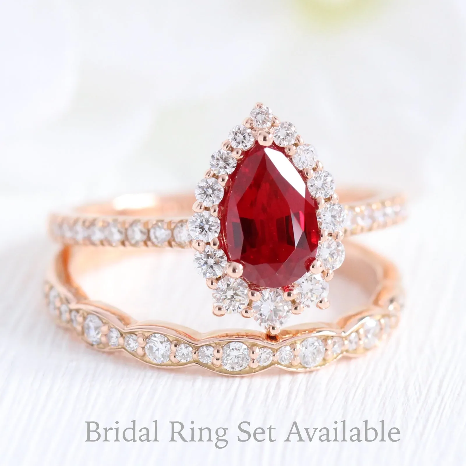 Pear Ruby Engagement Ring in Tiara Halo Diamond Pave Band