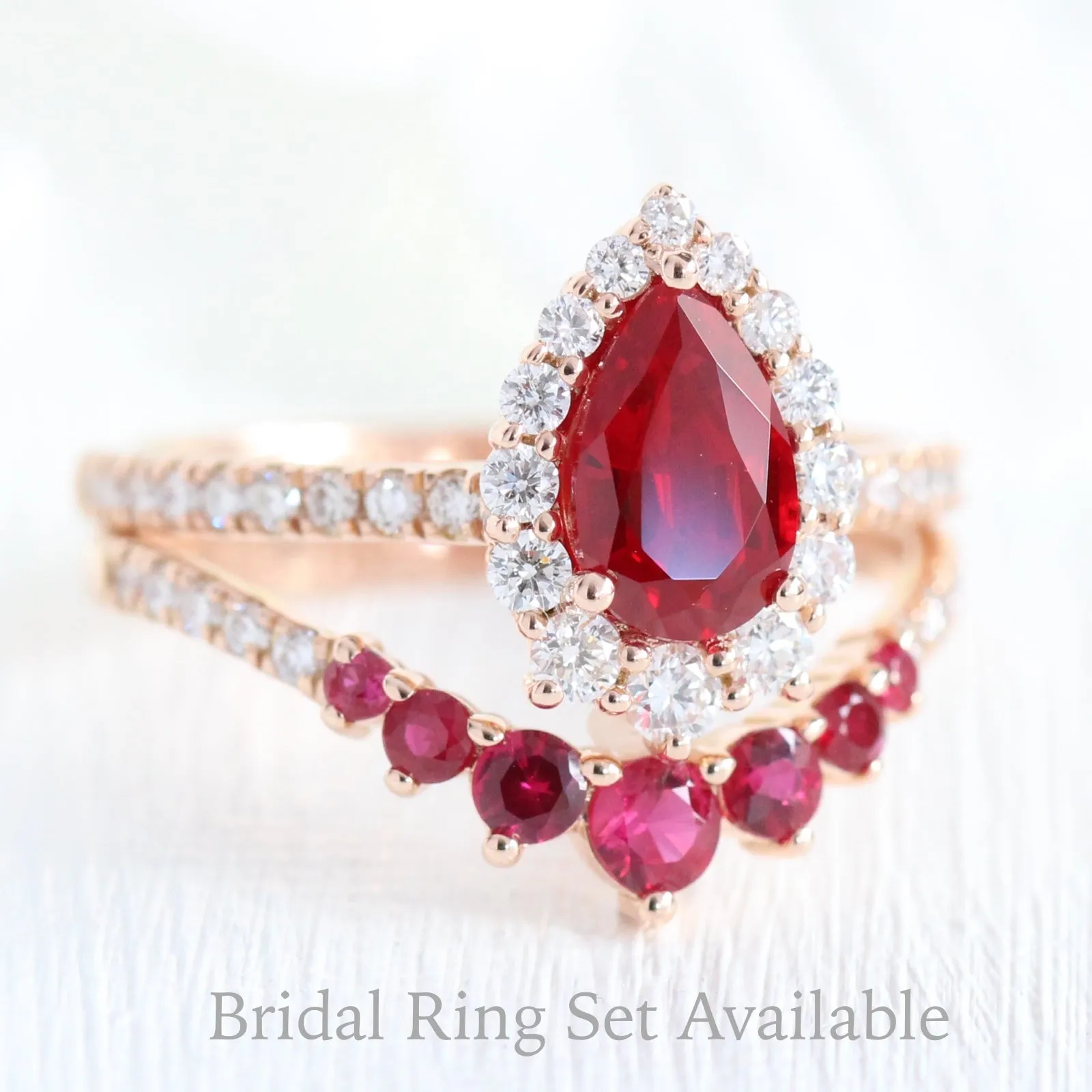 Pear Ruby Engagement Ring in Tiara Halo Diamond Pave Band