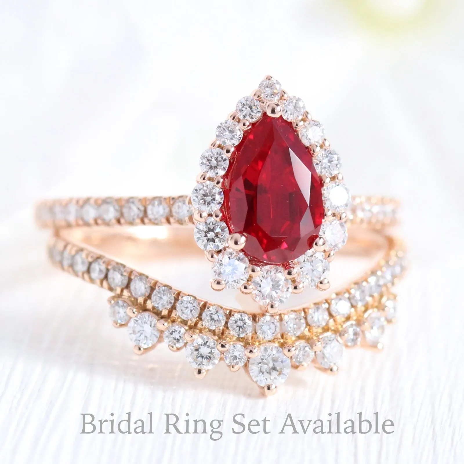 Pear Ruby Engagement Ring in Tiara Halo Diamond Pave Band